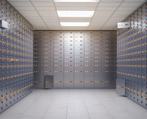 Moderner Banktresorraum mit Reihen grauer Bankschließfächer und nummerierten Schlössern, symbolisch für Sicherheit und Verwahrung von Vermögenswerten.