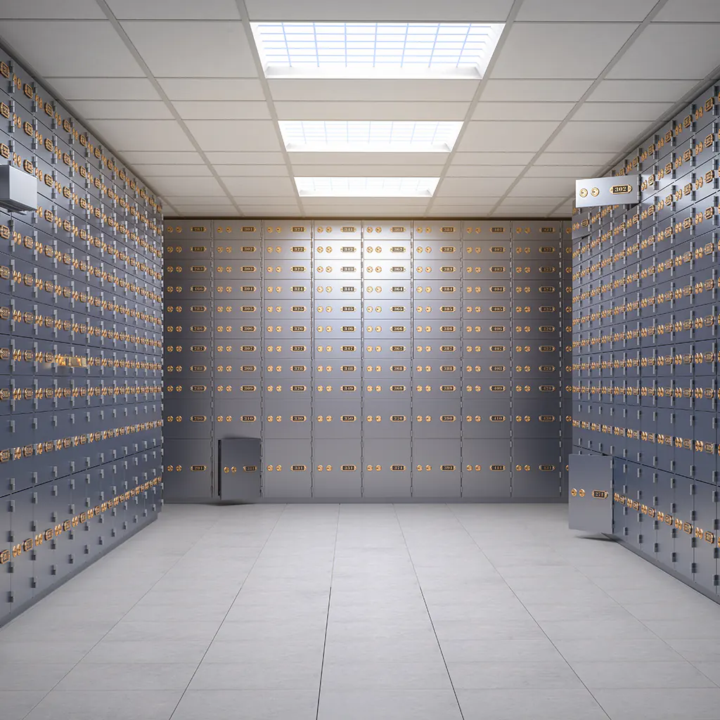 Moderner Banktresorraum mit Reihen grauer Bankschließfächer und nummerierten Schlössern, symbolisch für Sicherheit und Verwahrung von Vermögenswerten.